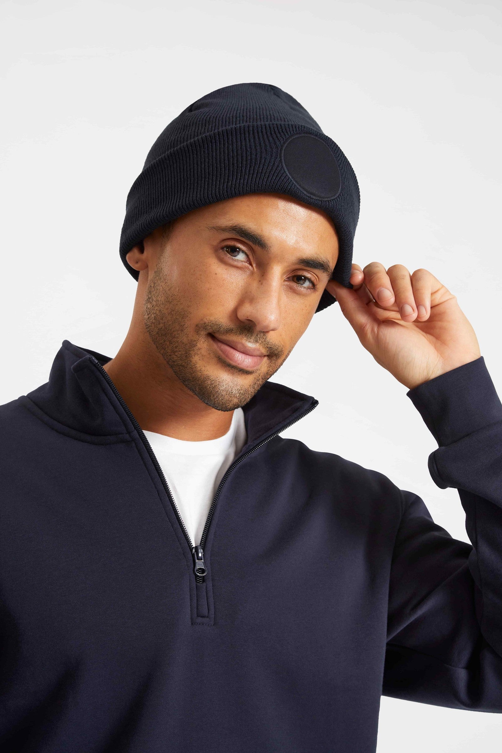 Uneek Circular Patch Beanie